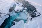 Iceland, Godafoss Waterfall. Aerial of waterfall in winter. Art Print